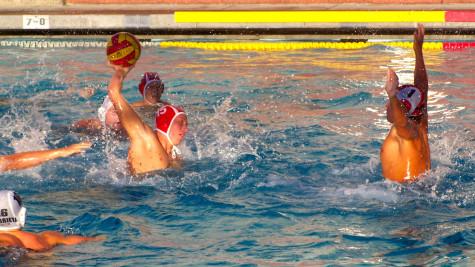 Sean Duncan makes a powerful move from center, scoring against his opponents.